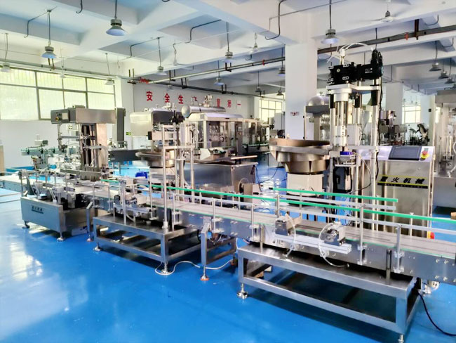 雙頭研磨液自動灌裝機(jī)壓塞旋蓋生產(chǎn)線